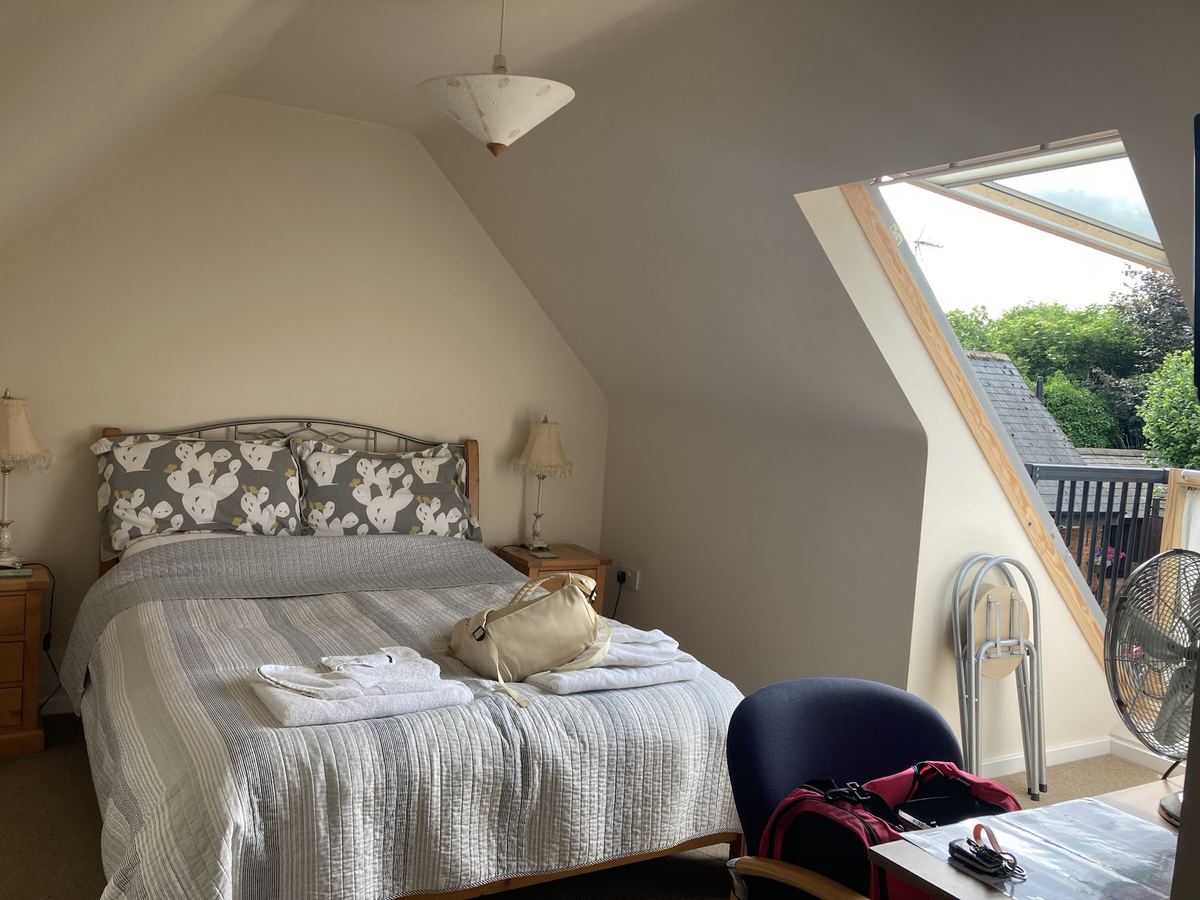 A double room under the eaves at The Old Post House